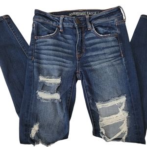 American Eagle Size 4 super stretch Distressed skinny jeans
